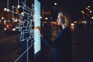 female professional utilizing a virtual touchscreen