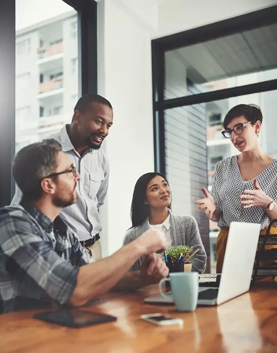 team collaborating in a meeting space